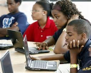 Imageof students using laptops