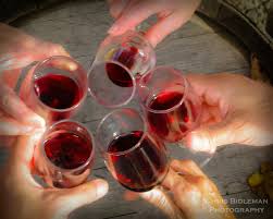 we raise our glasses